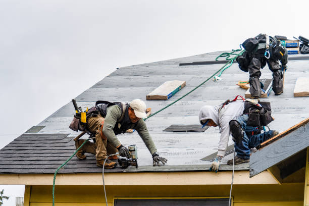 Professional Roofing technician working in Paupack, PA